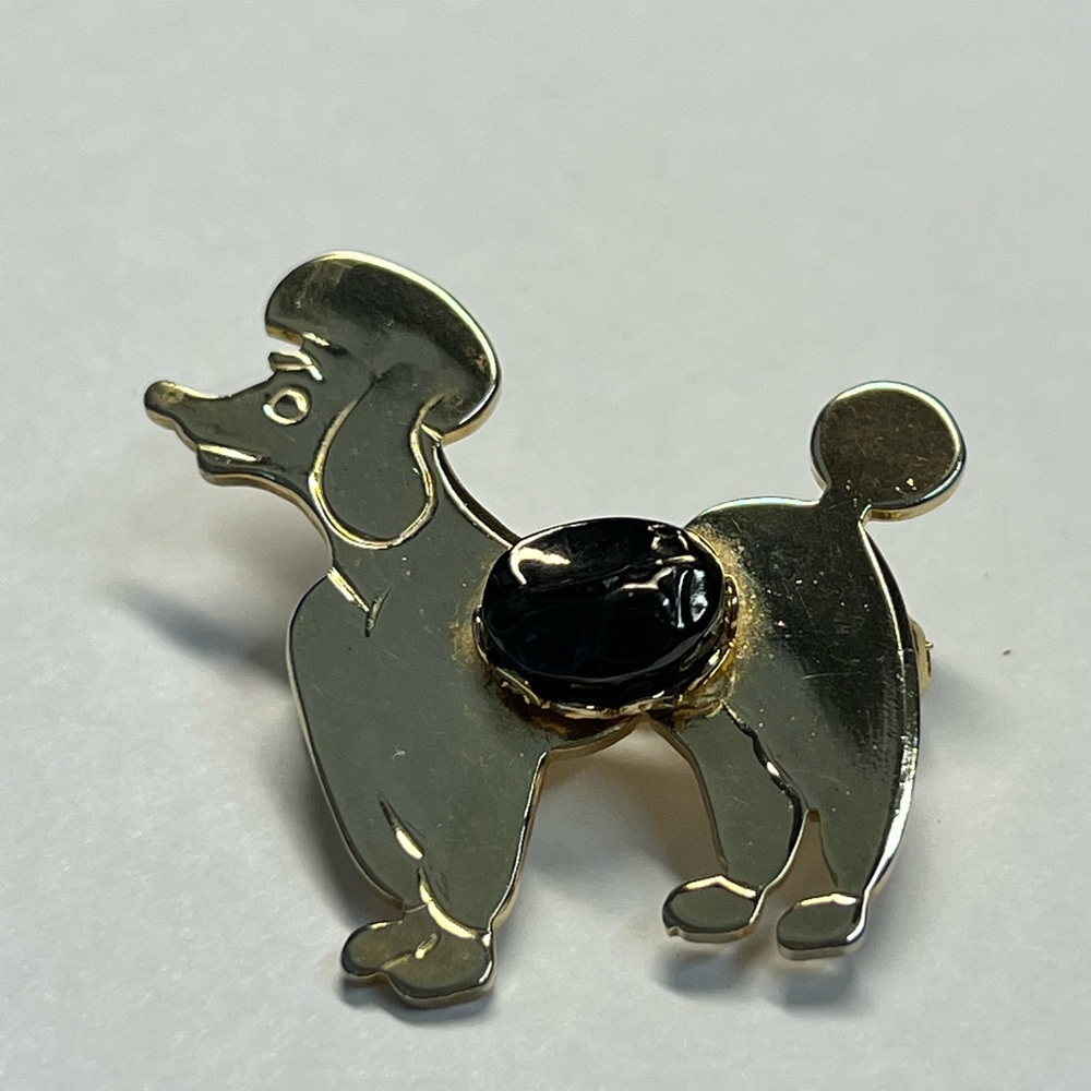 Poodle pin w/ black center gold tone